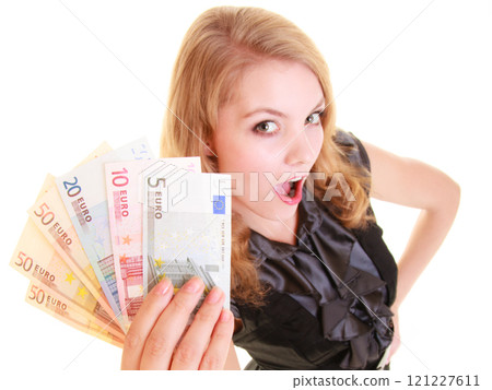 Economy finance. Woman holds euro currency money. Economy finance. Woman holds euro currency money. 121227611