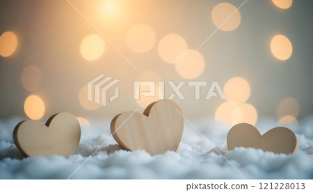 Wooden heart decorations arranged white snow with a dreamy golden background, a romantic atmosphere 121228013