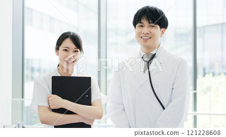 Doctors and nurses standing with a smile 121228608