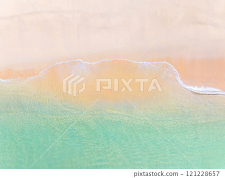 Amazing sea surface in summer season background,Nature waves sea beach background,High angle view waves seascape nature view,Wide angle drone shot,Top view beach sand Amazing sea surface in summer season background,Nature waves sea beach background,High angle view waves seascape nature view,Wide angle drone shot,Top view beach sand 121228657
