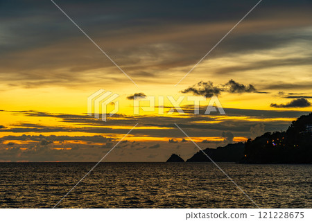 Beautiful clouds in sunset or sunrise over sea,Colorful scenery sunset sky, Amazing clouds wonderful light sky background 121228675