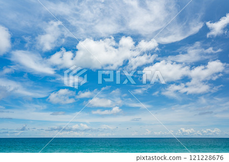 Beautiful clouds in sunny sky over sea nature background 121228676