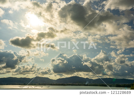 Beautiful clouds in sunset or sunrise over sea,Colorful scenery sunset sky, Amazing clouds wonderful light sky background 121228689