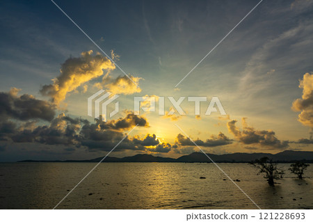 Beautiful clouds in sunset or sunrise over sea,Colorful scenery sunset sky, Amazing clouds wonderful light sky background 121228693