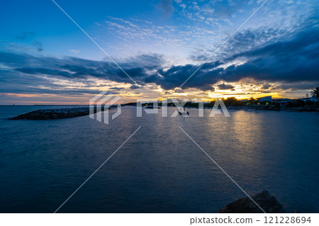 Beautiful clouds in sunset or sunrise over sea,Colorful scenery sunset sky, Amazing clouds wonderful light sky background 121228694