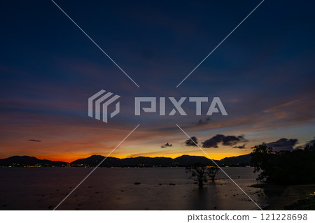 Beautiful clouds in sunset or sunrise over sea,Colorful scenery sunset sky, Amazing clouds wonderful light sky background 121228698