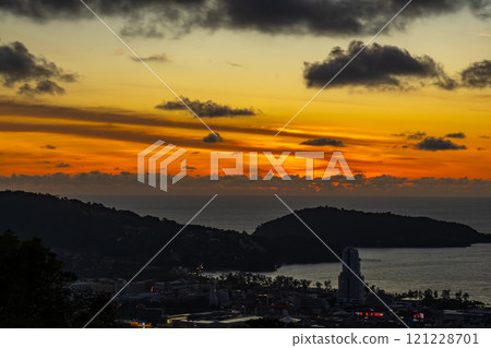 Beautiful clouds in sunset or sunrise over sea,Colorful scenery sunset sky, Amazing clouds wonderful light sky background 121228701