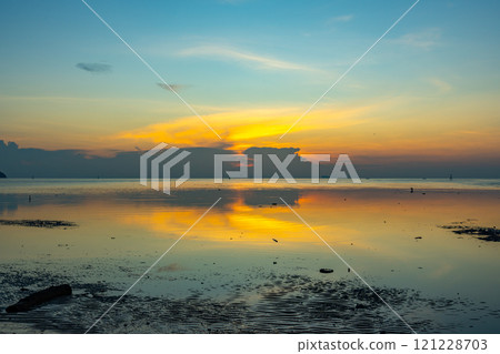 Beautiful clouds in sunset or sunrise over sea,Colorful scenery sunset sky, Amazing clouds wonderful light sky background 121228703
