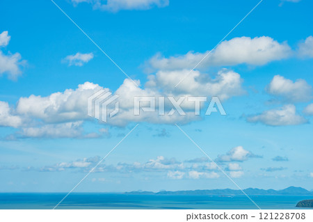 Beautiful clouds in sunny sky over sea nature background Beautiful clouds in sunny sky over sea nature background 121228708