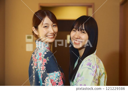 Women in a room at a ryokan. Photo courtesy of Shiratama no Yu Izumi Kei. 121229386