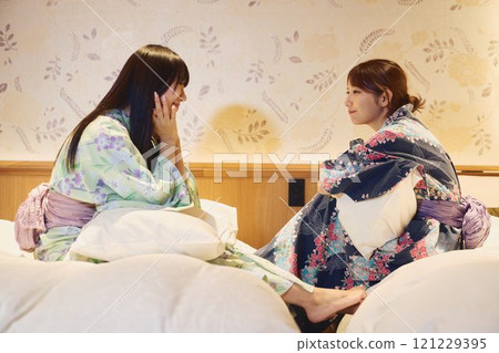 Women in a room at a ryokan. Photo courtesy of Shiratama no Yu Izumi Kei. 121229395
