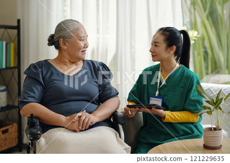 Nurse Visiting To Senior Woman At Home Nurse Visiting To Senior Woman At Home 121229635