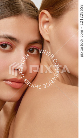 Contemporary art collage. Two women posed closely, circular INNER CONFIDENCE SHINES THROUGH text reflects radiance, unity, and natural self-assurance. 121229658