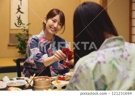 Women enjoying a meal at a ryokan (Japanese inn) Photo courtesy of Shiratama no Yu Izumikei Women enjoying a meal at a ryokan (Japanese inn) Photo courtesy of Shiratama no Yu Izumikei 121231694