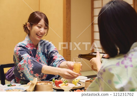 Women enjoying a meal at a ryokan (Japanese inn) Photo courtesy of Shiratama no Yu Izumikei 121231702