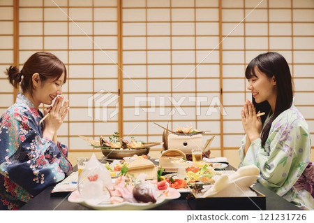 Women enjoying a meal at a ryokan (Japanese inn) Photo courtesy of Shiratama no Yu Izumikei 121231726