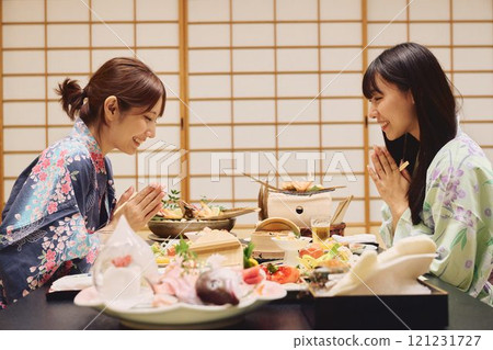 Women enjoying a meal at a ryokan (Japanese inn) Photo courtesy of Shiratama no Yu Izumikei 121231727