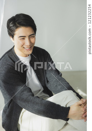 Young man at the window side 121232254