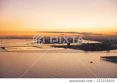 Sunset over Tokyo Bay seen from an airplane Sunset over Tokyo Bay seen from an airplane 121233029