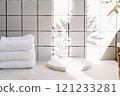 Marble white round podium for bathing products in bathroom, spa shampoo, shower gel, liquid soap 121233281