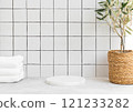 Marble white round podium for bathing products in bathroom, spa shampoo, shower gel, liquid soap 121233282