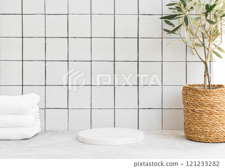 Marble white round podium for bathing products in bathroom, spa shampoo, shower gel, liquid soap 121233282