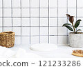 Marble white round podium for bathing products in bathroom, spa shampoo, shower gel, liquid soap 121233286