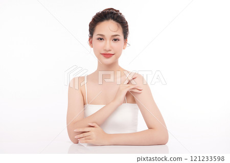 Beautiful young asian woman with clean fresh skin on white background, Face care, Facial treatment, Cosmetology, beauty and spa, Asian women portrait. Beautiful young asian woman with clean fresh skin on white background, Face care, Facial treatment, Cosmetology, beauty and spa, Asian women portrait. 121233598