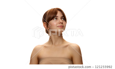 Portrait of attractive young woman without makeup, showing her perfect smooth, spotless skin against white studio background Portrait of attractive young woman without makeup, showing her perfect smooth, spotless skin against white studio background 121233992