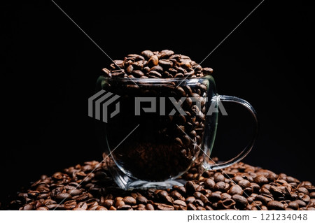 Coffee beans that have been roasted in glass cup 121234048