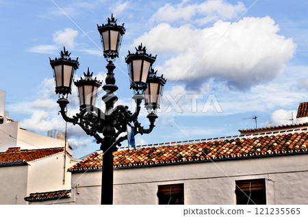 Beautiful classic ornate lamppost of the streets of Mijas, Malaga 121235565
