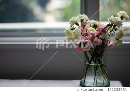 bouquet of carnations by the window bouquet of carnations by the window 121235661