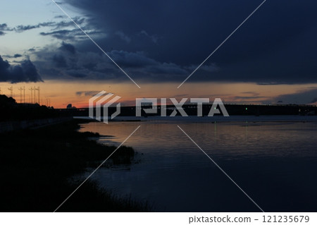Sunset over the Dnipro River in Kyiv 121235679