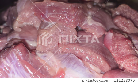 Turkey goulash for cooking homemade meat dish on a plate is cut into large cubes Turkey goulash for cooking homemade meat dish on a plate is cut into large cubes 121238079