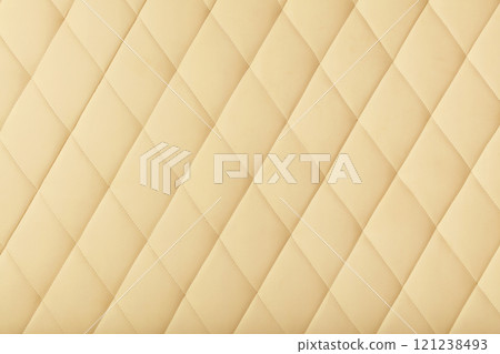 Beige leather upholstery background texture Beige leather upholstery background texture 121238493