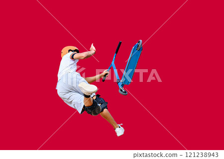 Young man practicing Scootering (Freestyle Scootering) in the new SkatePark of the central park of Igualada, Barcelona, Spain Young man practicing Scootering (Freestyle Scootering) in the new SkatePark of the central park of Igualada, Barcelona, Spain 121238943