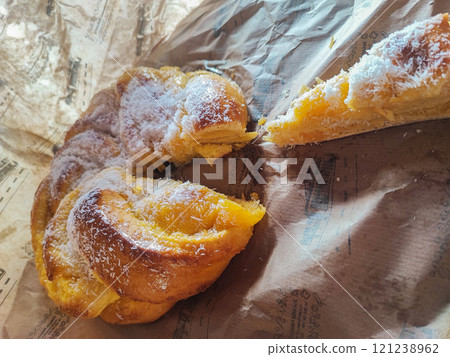 Portuguese sponge cake wrapped in the typical paper used on the baking. 121238962