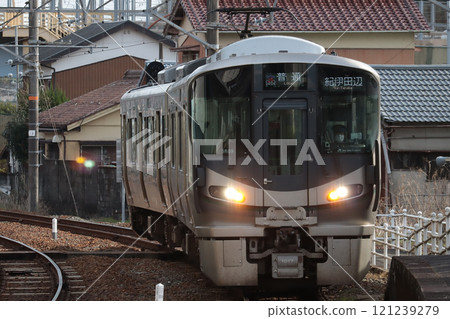 227 series 1000 series local train (SR09) entering Shirahama Station 121239279