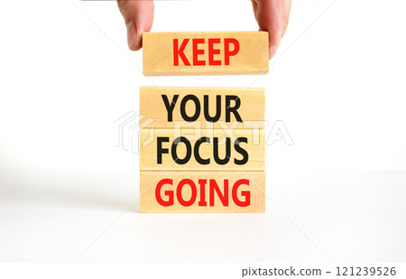 Keep your focus going symbol. Concept words Keep your focus going on beautiful wooden blocks. Beautiful white table white background. Business and keep your focus going concept. Copy space. Keep your focus going symbol. Concept words Keep your focus going on beautiful wooden blocks. Beautiful white table white background. Business and keep your focus going concept. Copy space. 121239526