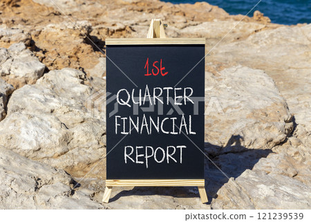 1st quarter financial report symbol. Concept words 1st quarter financial report on beautiful black blackboard. Beautiful stone background. Business 1st quarter financial report concept. Copy space. 121239539