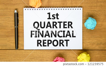 1st quarter financial report symbol. Concept words 1st quarter financial report on beautiful white note. Beautiful wooden background. Business 1st quarter financial report concept. Copy space. 121239575