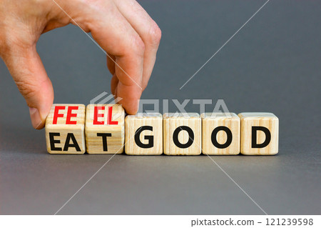 Eat and feel good symbol. Concept words Eat good Feel good on wooden cubes. Beautiful grey table grey background. Doctor hand. Healthy lifestyle eat and feel good concept. Copy space. Eat and feel good symbol. Concept words Eat good Feel good on wooden cubes. Beautiful grey table grey background. Doctor hand. Healthy lifestyle eat and feel good concept. Copy space. 121239598