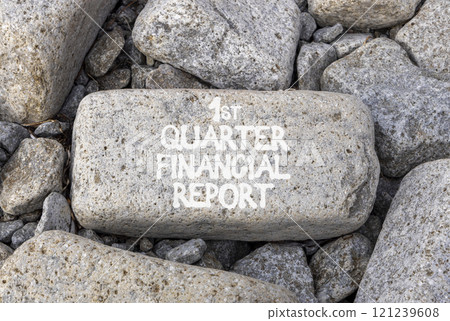 1st quarter financial report symbol. Concept words 1st quarter financial report on beautiful grey stone. Beautiful grey stones background. Business 1st quarter financial report concept. Copy space. 1st quarter financial report symbol. Concept words 1st quarter financial report on beautiful grey stone. Beautiful grey stones background. Business 1st quarter financial report concept. Copy space. 121239608