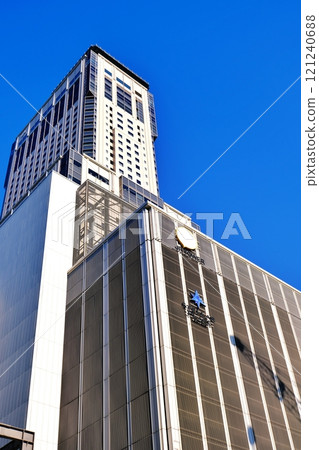 JR Tower shining against the blue sky 121240688