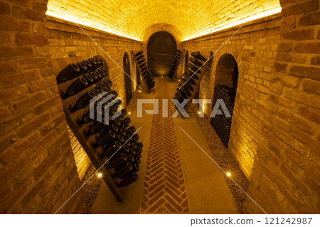 Stored wine bottles, wine cella, Canale, Piedmont, Italy Stored wine bottles, wine cella, Canale, Piedmont, Italy 121242987