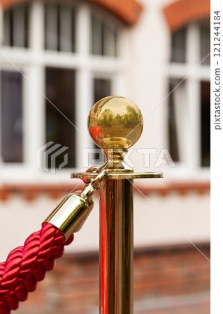 Red security rope outside 121244184