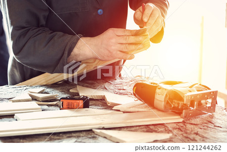 Measure wooden log and drawing with pencil line Measure wooden log and drawing with pencil line 121244262