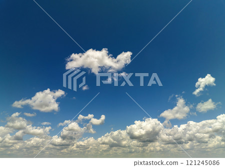 Rain clouds forming on blue Florida sky. Colorful summer skyscape 121245086