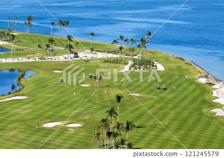 Large golf course and sports grounds with green grass in Boca Grande, small town on Gasparilla Island in southwest Florida Large golf course and sports grounds with green grass in Boca Grande, small town on Gasparilla Island in southwest Florida 121245579