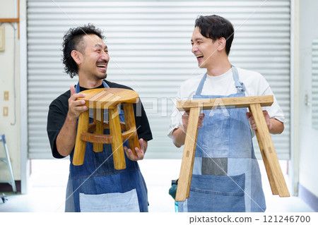 A man doing DIY at a workshop 121246700